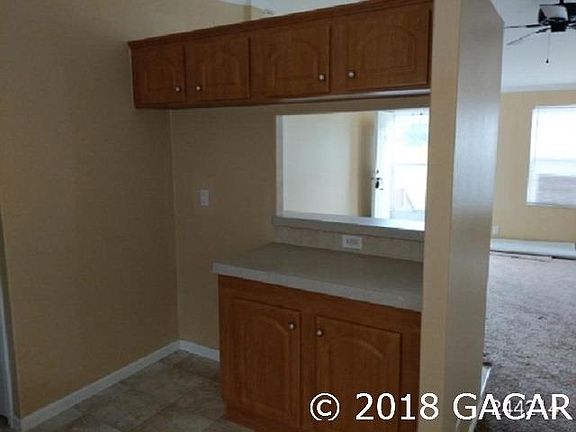 5th image of 7540 N Fernandina Ave