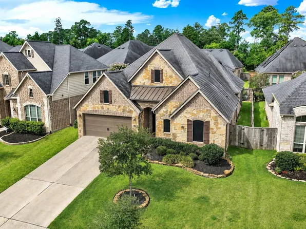 510 Blossom Cove Ct, Pinehurst, TX 77362
