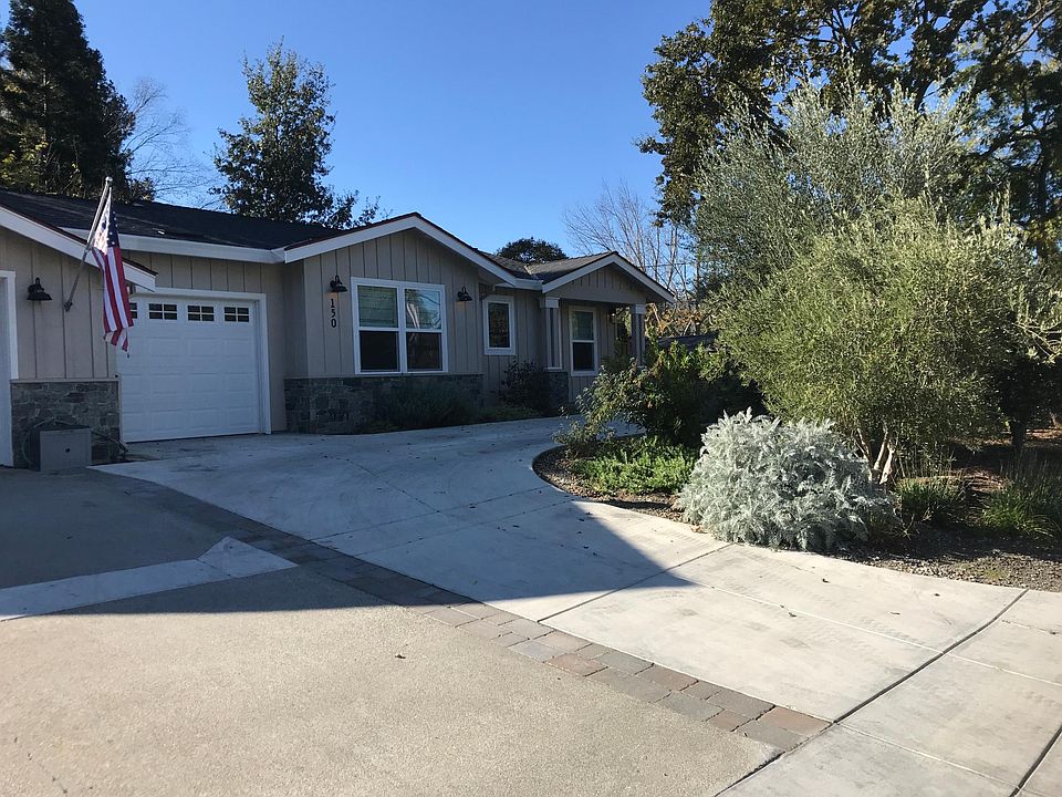 Driveway to garage and parking on-site.