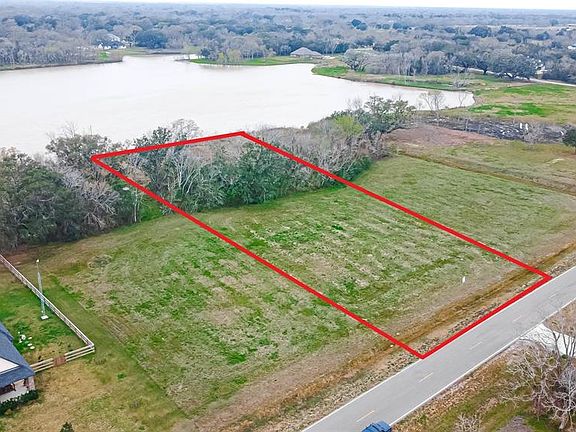 Enjoy watching the sunset from your back porch across the tranquil lake.