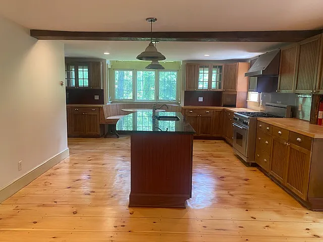 Kitchen with center island for stools