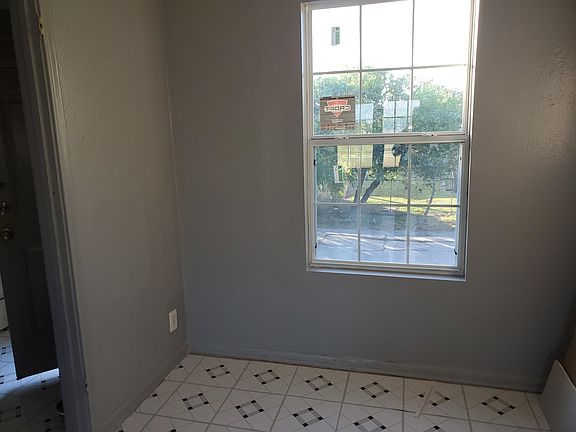 Separate dining room, staged furniture not included