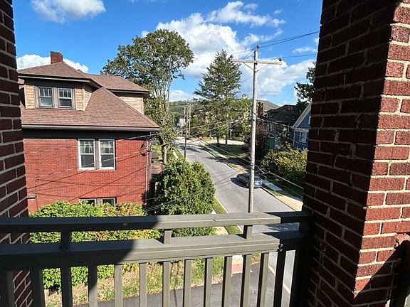 Front porch, view towards Horace Mann Elementary.