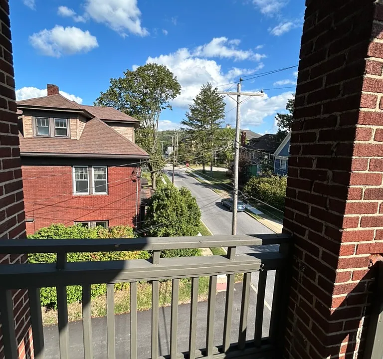 Front porch, view towards Horace Mann Elementary.