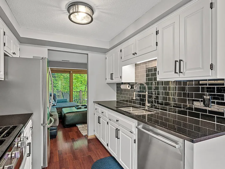 Updated kitchen with all new stainless steel appliances. Granite countertops.