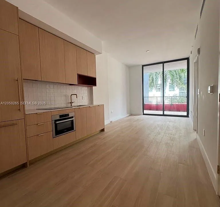 90 NE 32nd St #210