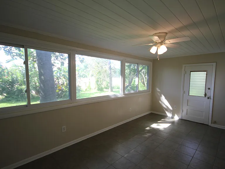 Picture window from back enclosed lanai. This is fully insulated and part of the house.