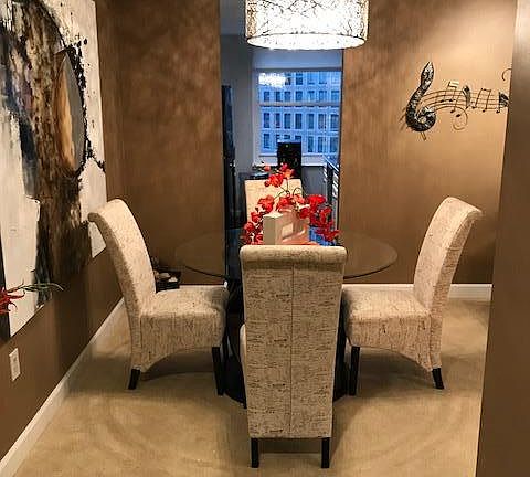 Dining room. Room can be reconfigured for larger dining table