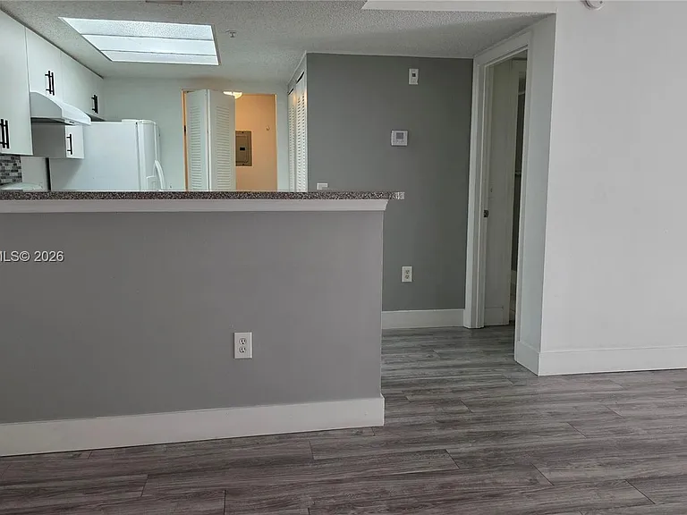 5011 Wiles Rd #203 — Photo 9