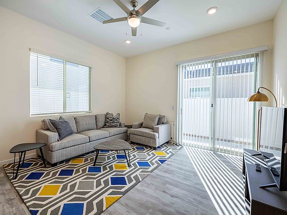 Experience the comfort of this bright and airy living space, perfect for relaxation.