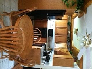 Eat in kitchen area
Black kitchen appliances included in sale of home