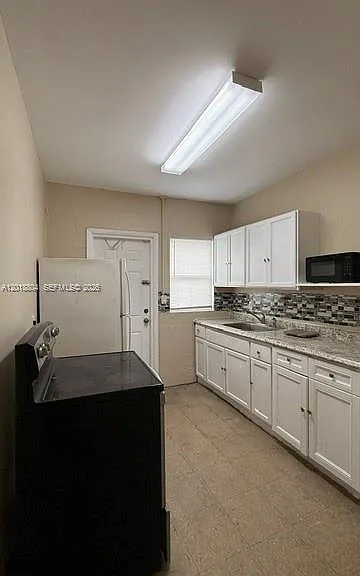 646 NW 14th Ter #WEST — Photo 12