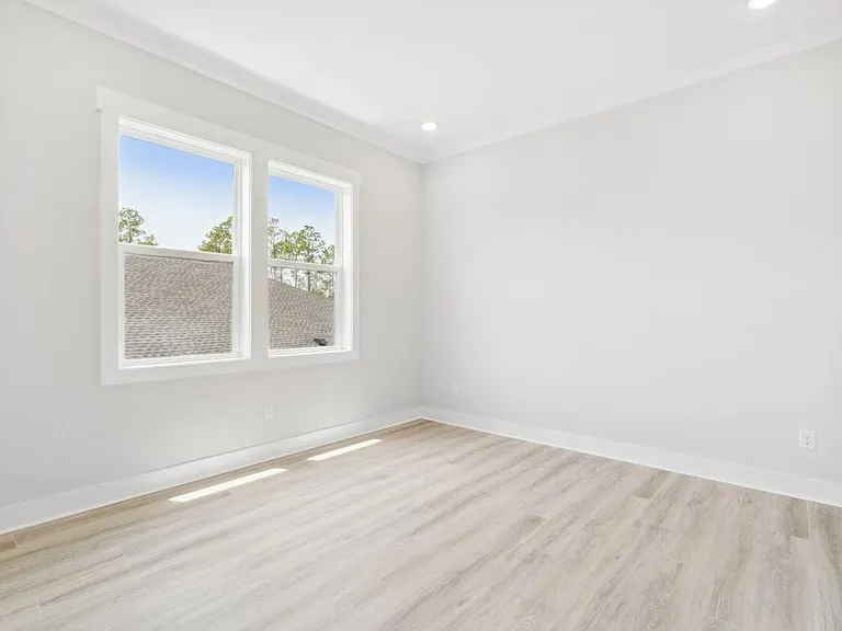 1 of 3 large additional bedrooms with ample closets.