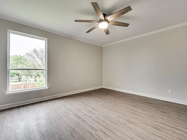 Master bedroom is up and has a view of backyard.