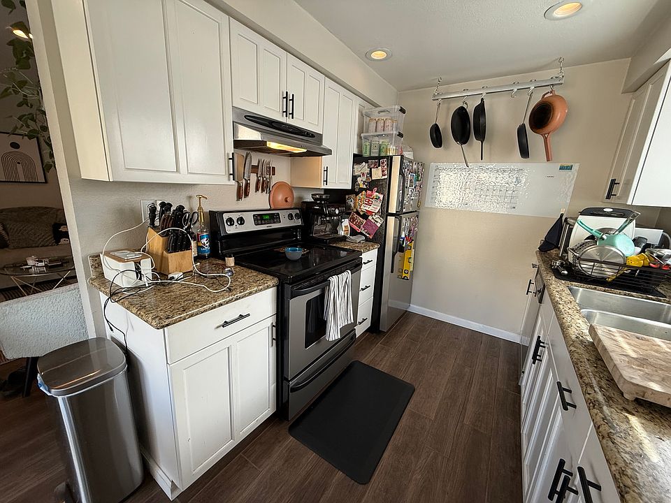 Kitchen with oven, dishwasher, and garbage disposal