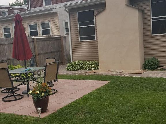 Back yard - sunroom with fireplace