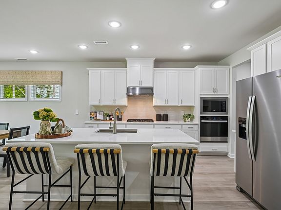 Kitchen in the Johnson floorplan at a Meritage Homes community in Clayton, NC.