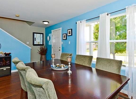 Separate formal dining area boast hardwood floors and open concept