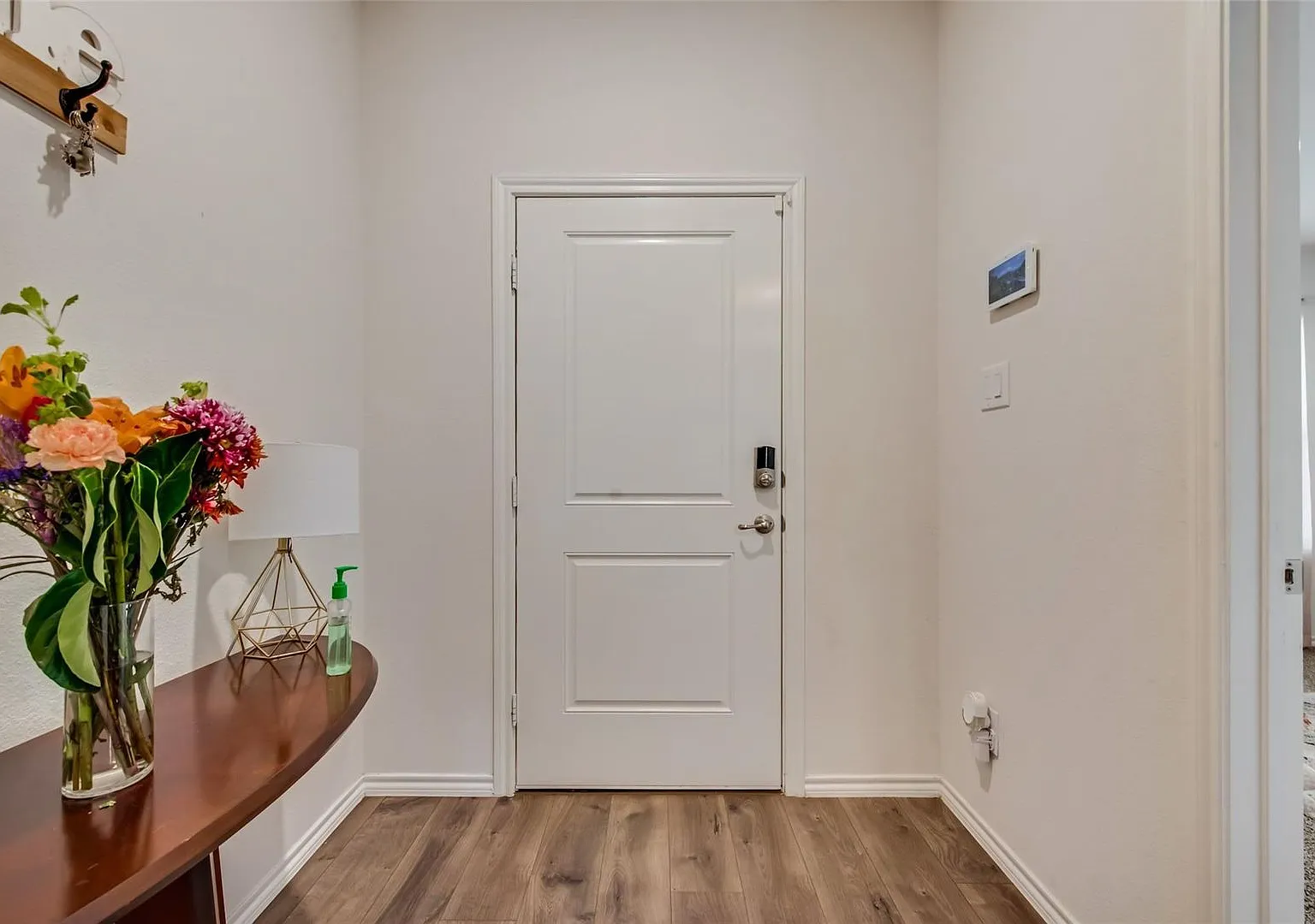 This 4-bedroom, 2-bath home is nestled within a pristine master-planned community and offers mode... — Photo 4