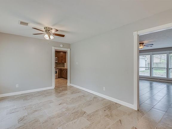 The Entry Room has access to the Living Area and Kitchen (Privacy obtained by using the Pocket Door!)