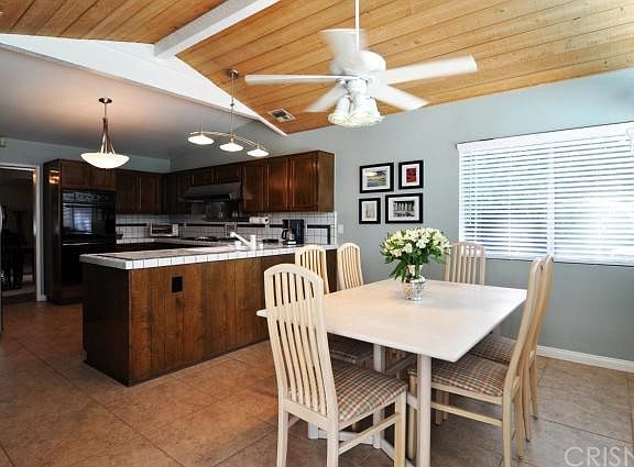 Eating Kitchen with beautiful wood ceiling
