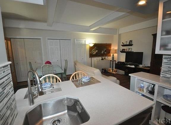 The new kitchen was opened to the living room and has Corina cou