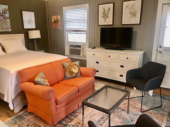 Seating area and Uber comfortable queen bed with new mattress