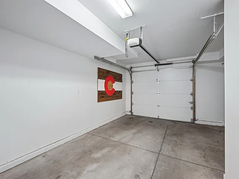 Keep your vehicle out of the elements in this private 1 car garage. There is access directly to the main level from the garage. NEMA 14-50 outlet to charge your electric vehicle (charger not included).