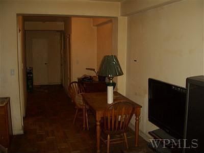 View of dining area/living room. 