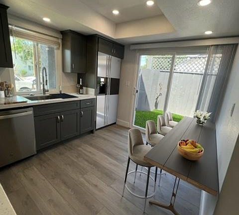Large Eden kitchen with slider glass door to private backyard