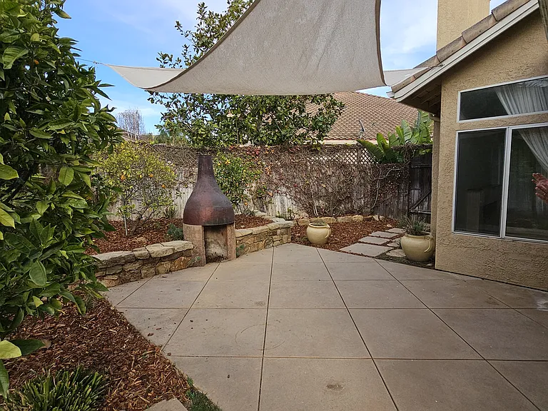 backyard fireplace and patio