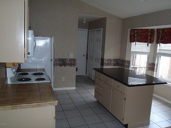 3rd image of 8208 International Village Dr