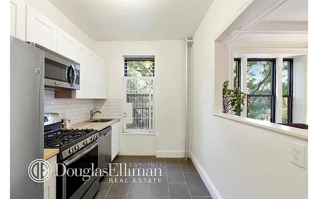 Sold by Douglas Elliman | media 18