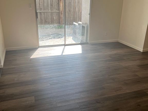 sliding glass door to backyard from living room hallway