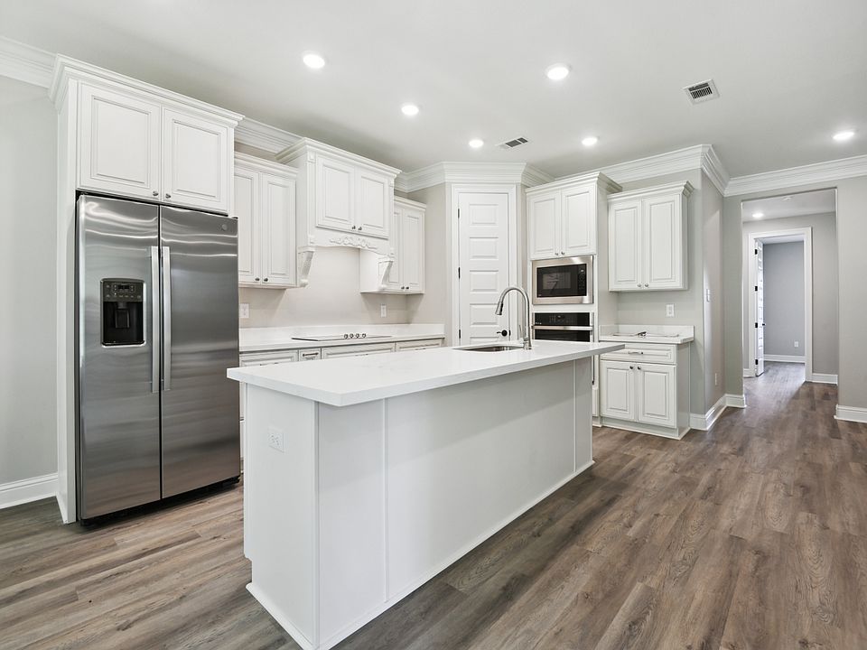 Kitchen in the Jules floorplan at a Meritage Homes community in Gulfport, MS.