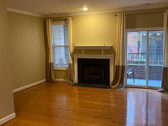 Gas Fireplace, Private Patio and gleaming Hardwood floors