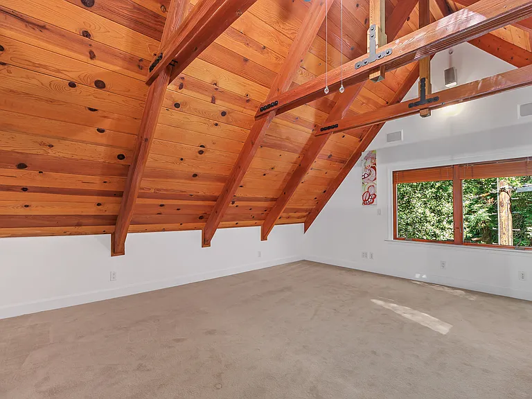 Bedroom 2. Cozy under-the-roof feel.