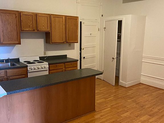 Kitchen front door & closet