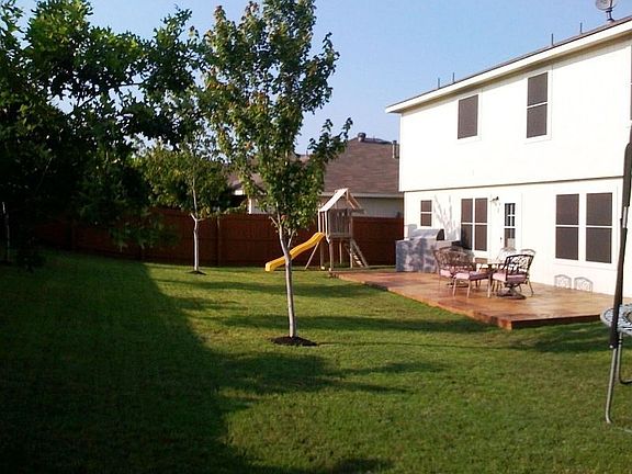 Huge Backyard lined w/ trees