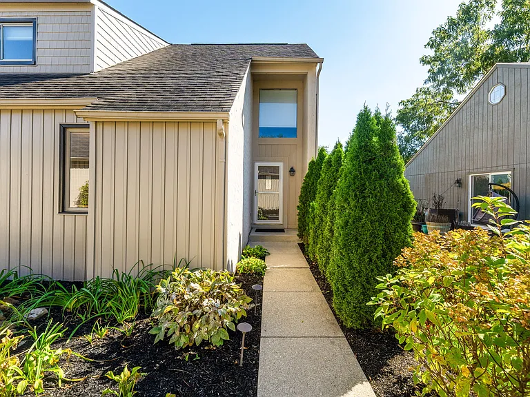 Front entrance w/lush courtyard