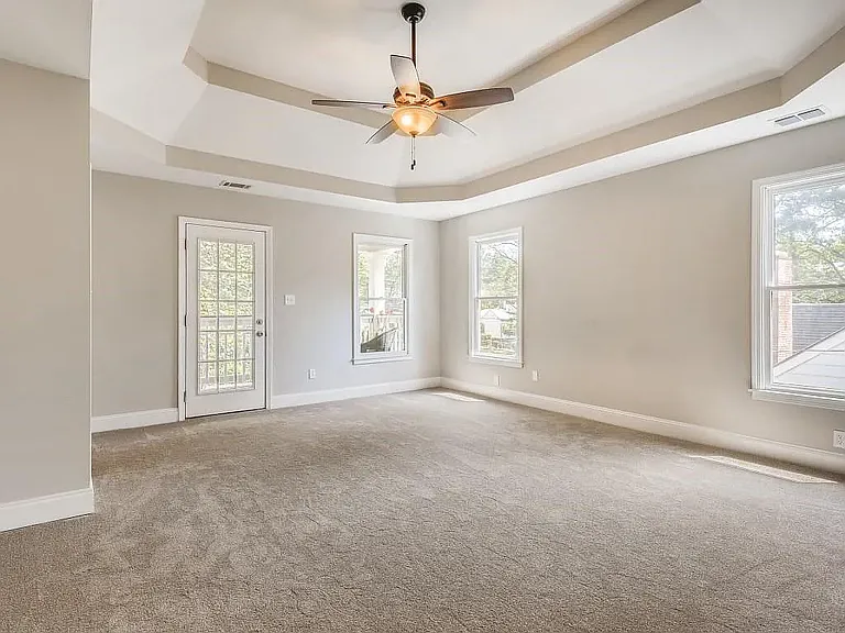 master bedroom before carpet was removed
