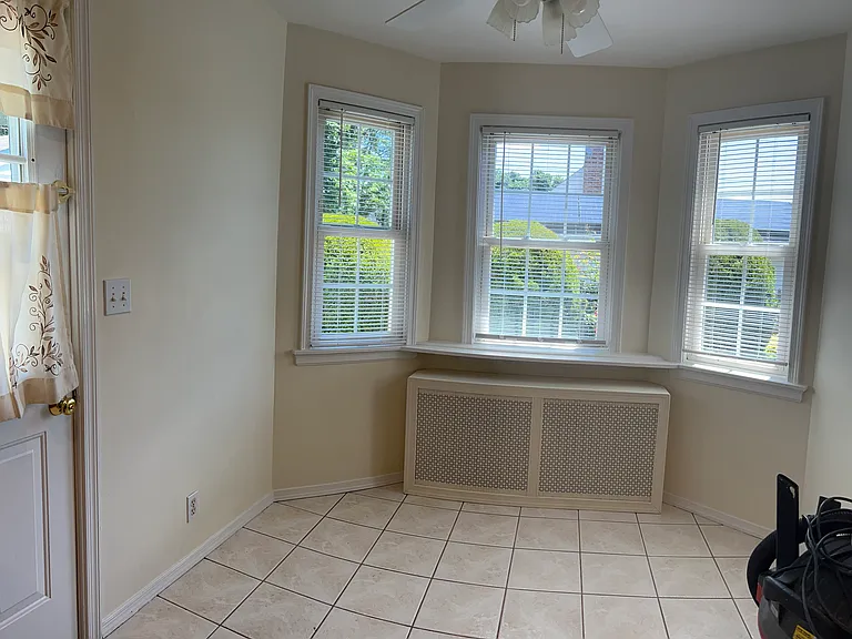 Kitchen nook with ceiling fan.