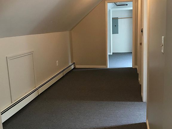 Hallway to bedroom, bathroom, and office/ bonus room