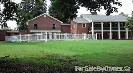 Back of house
						:
						Large balcony, walk out finished basement, beautiful inground pool & Jacuzzi
