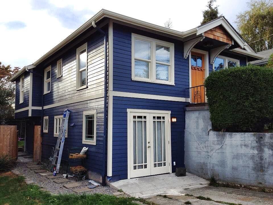 Two entry points. Side back door and front entry - lower unit. 1 designated Parking space belongs to Lower unit also. Shared Back yard small space