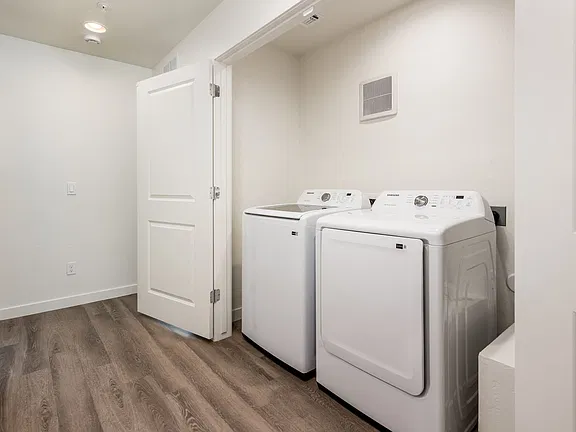 In-home laundry area — representative home at Deer Valley 24.