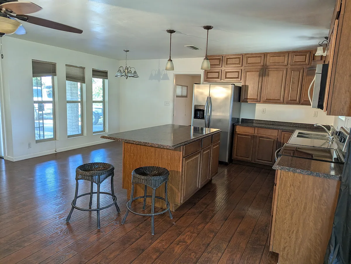 Beautiful remolded kitchen open to dinning and family rooms and back yard. - 321 W Century Ave