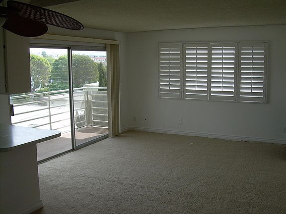 Living Room & Balcony outside. Vertical Living Room Blinds (