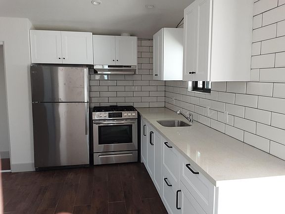 Quartz countertops and stainless appliances