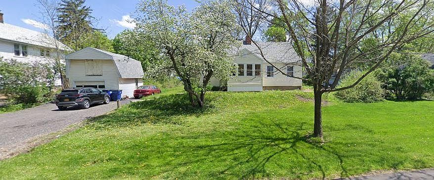 Front of home. House looks very smaller than it actually is. Rear of home has a dormer which makes for huge rooms upstairs. Amazing layout. Legal egress window in basement.
